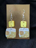 lemons on white square and yellows squares