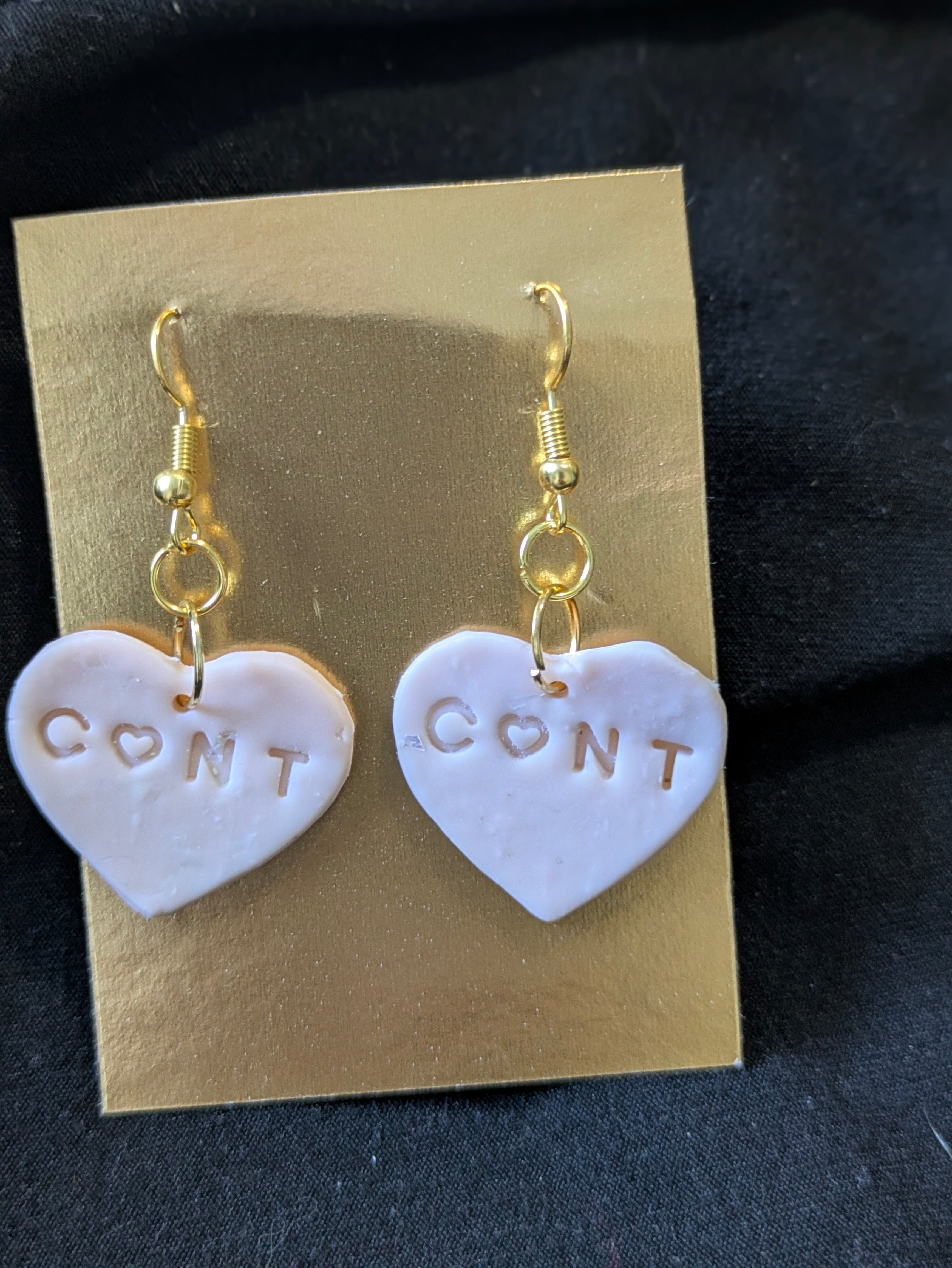 light pink hearts with cunt on them