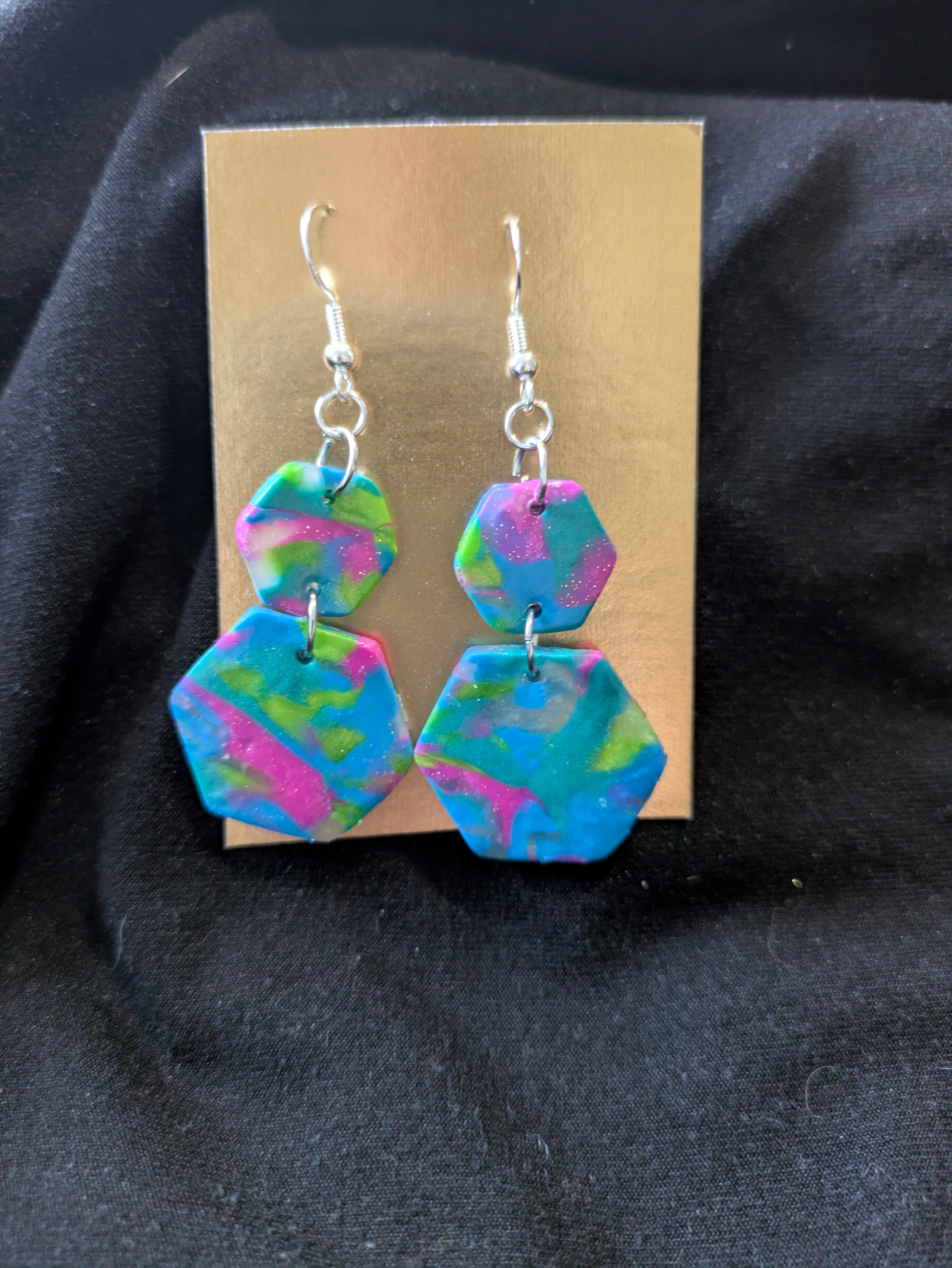 Translucent, pink, blue and green hexagons