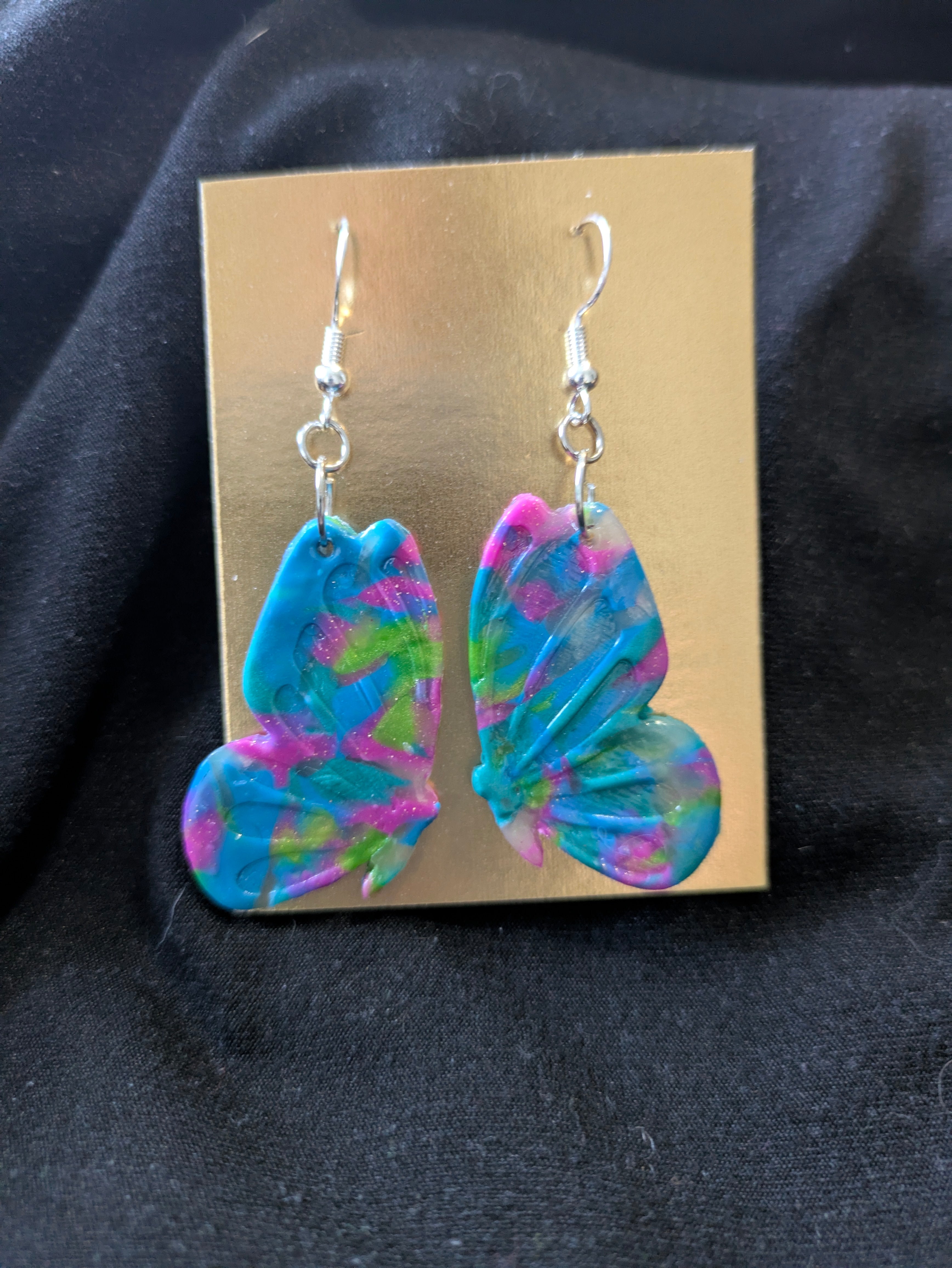 Translucent with Pink, blue and green butterflies