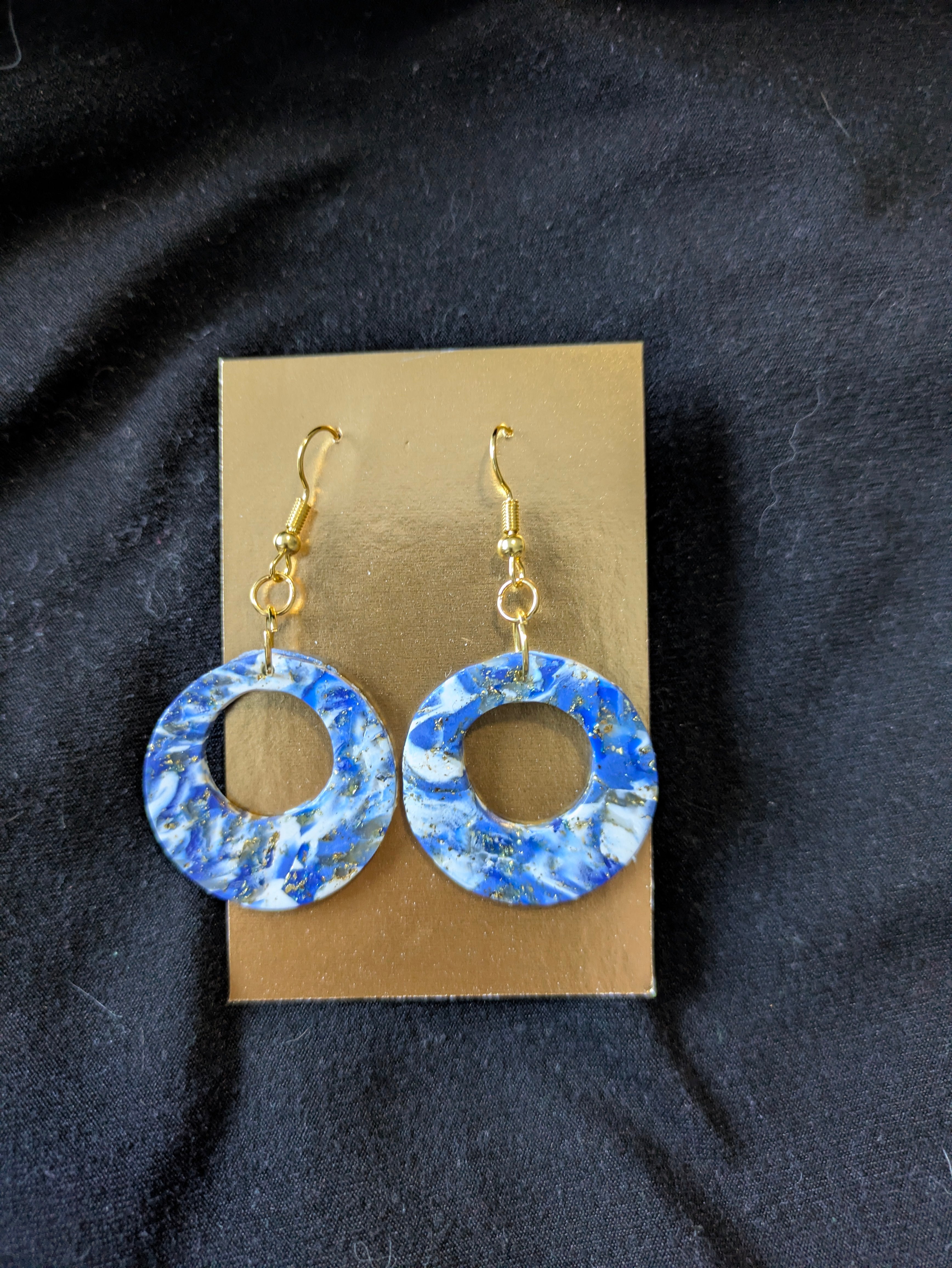 Blues and white with gold leafing circles