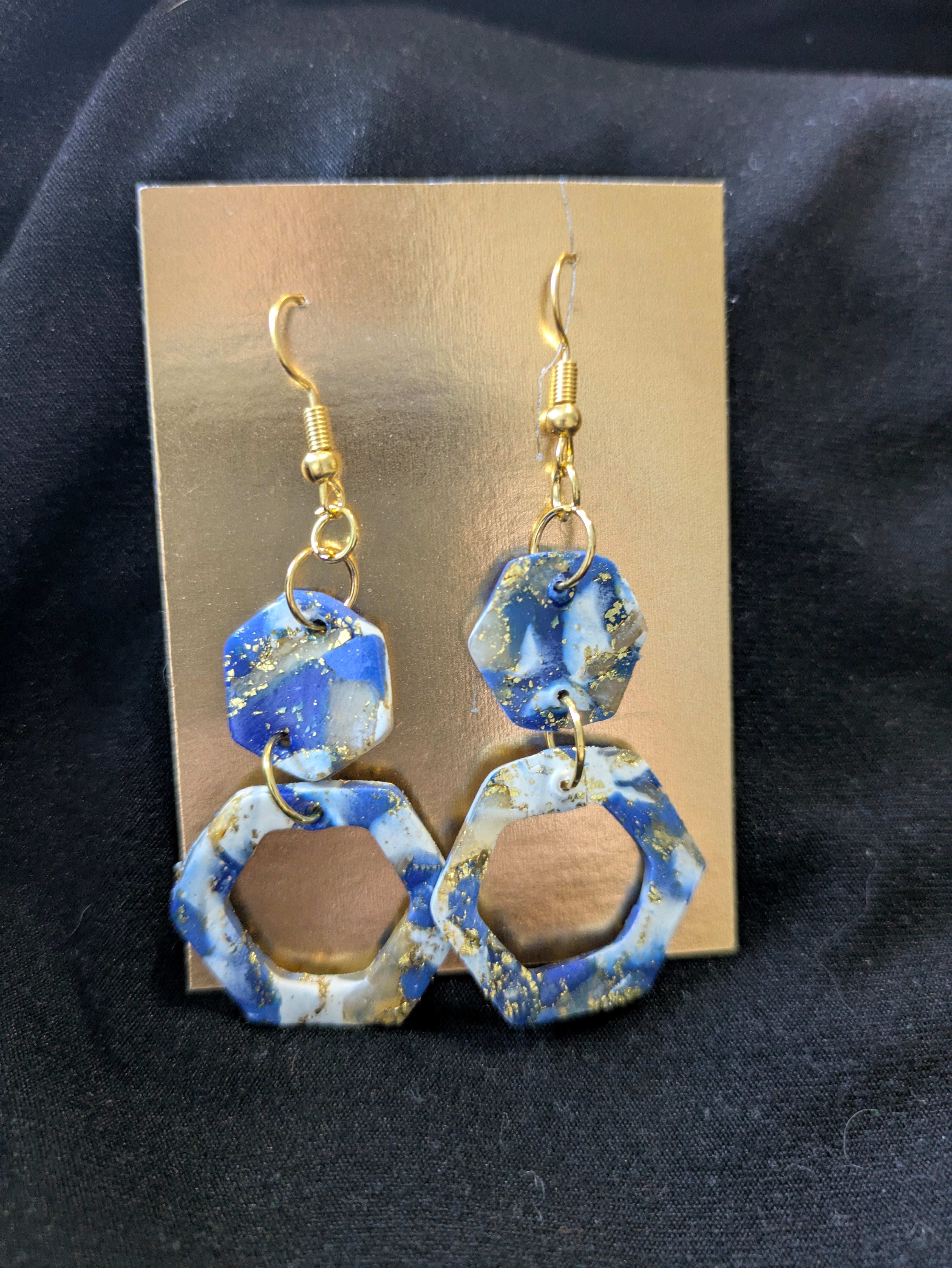 Blues and white with translucent and gold leafing hexagons