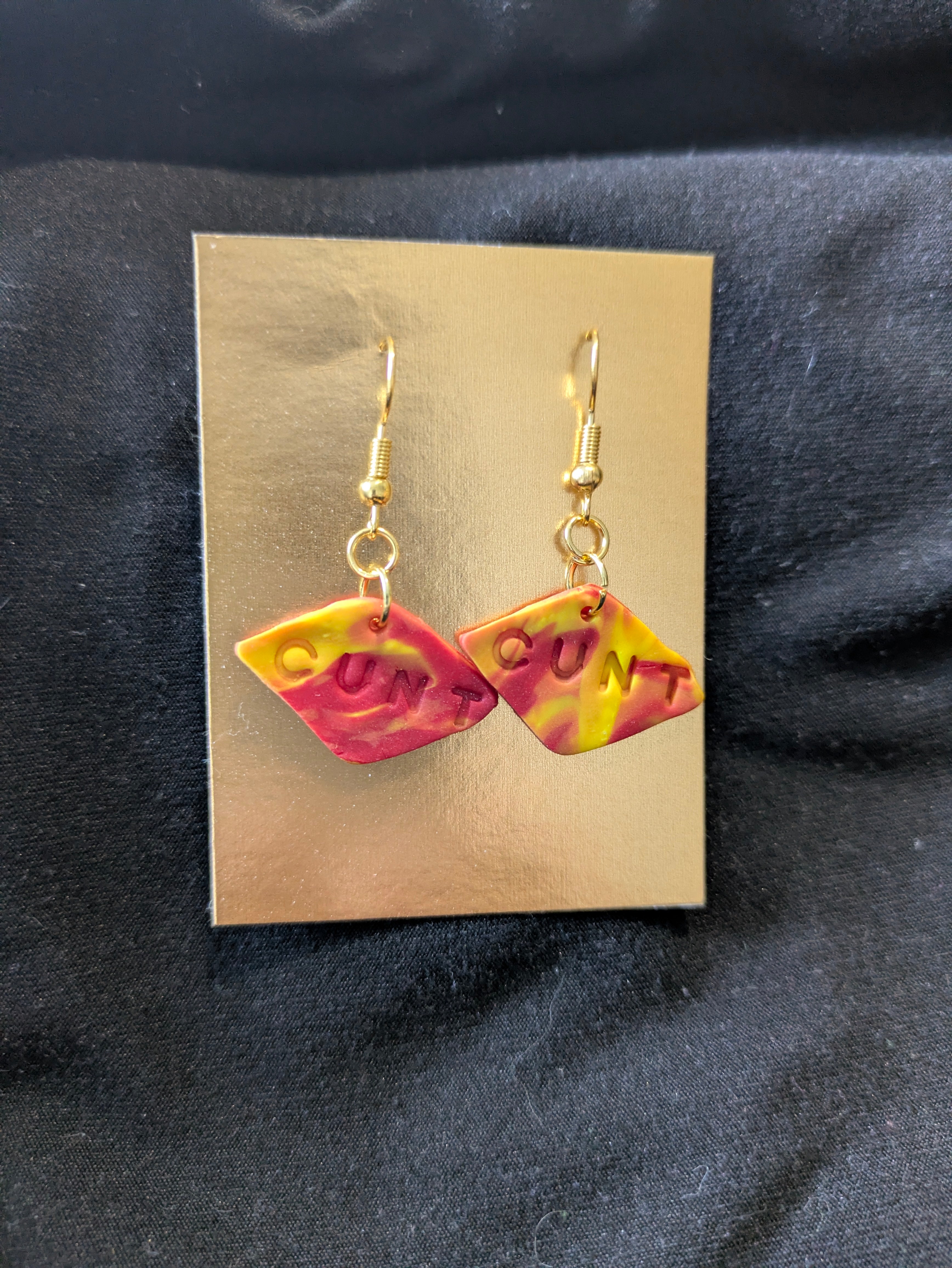Red orange and yellow diamond with cunt