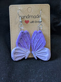 Bright and light purple sparkly butterflies