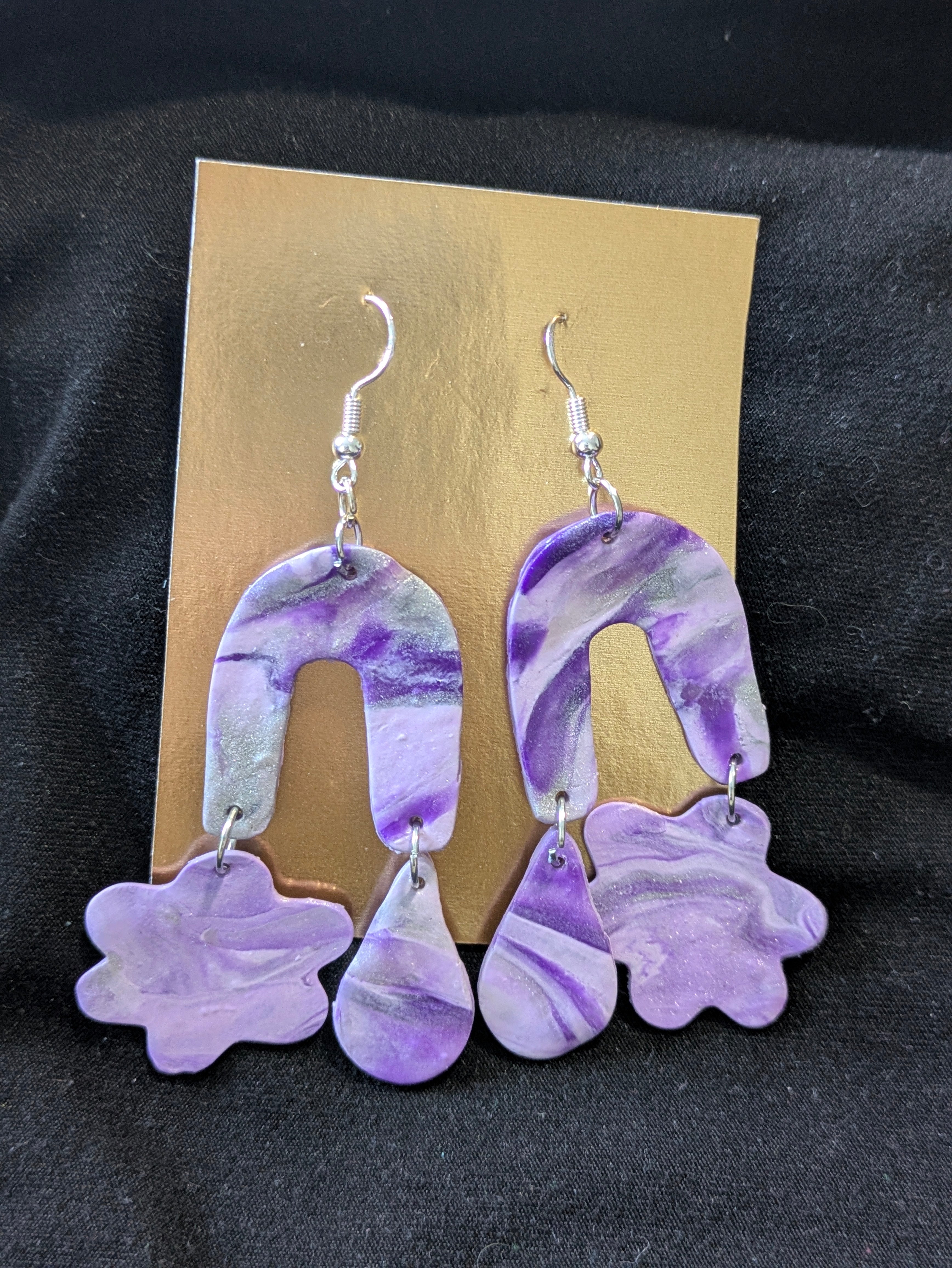 Purples, silver and translucent rainbows with cloud and drop
