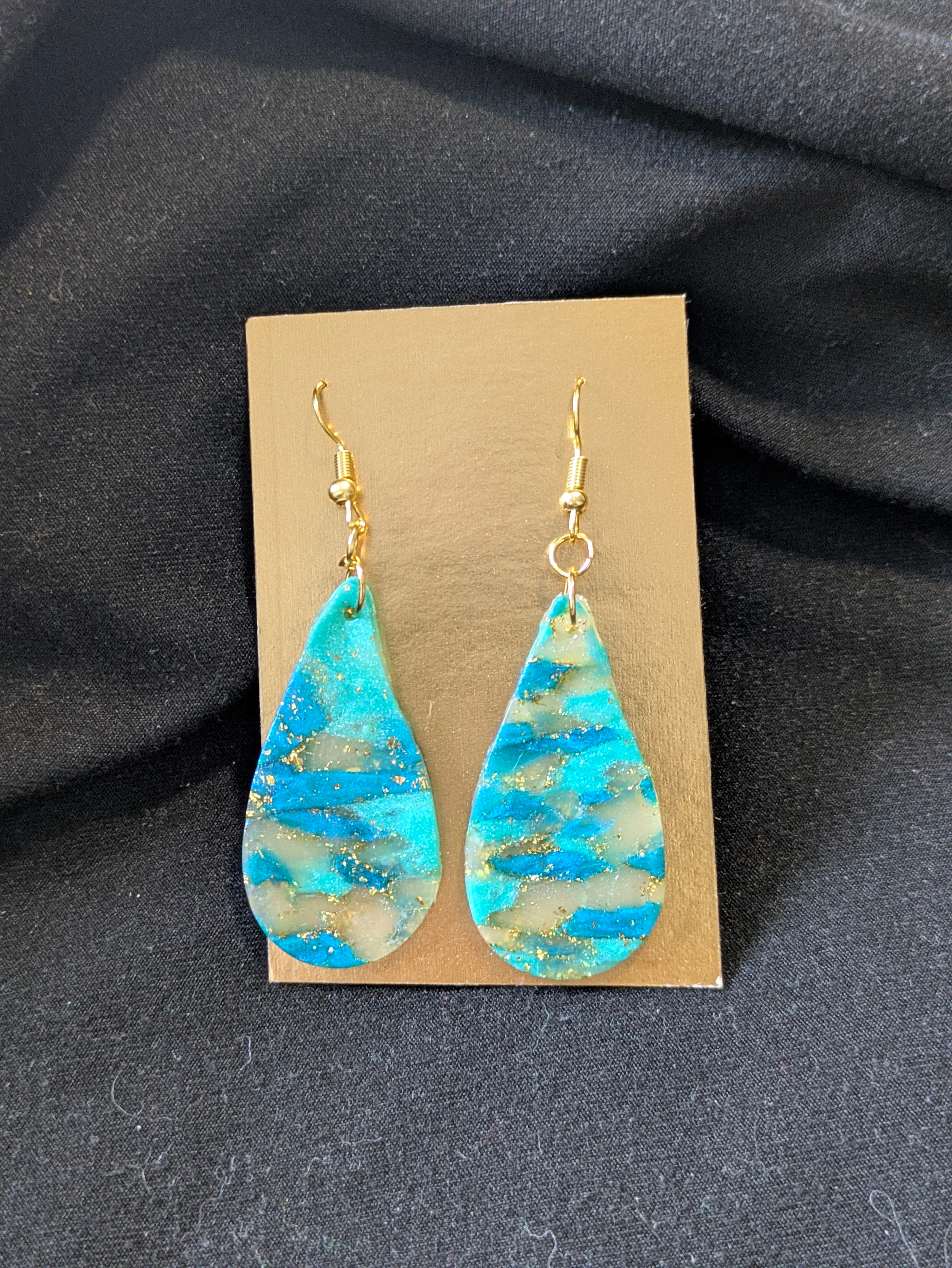 Blues gold leafing and translucent drops