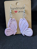 Pink and purple with white sparkly butterflies