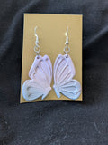 Purple pink and blue sparkly butterflies