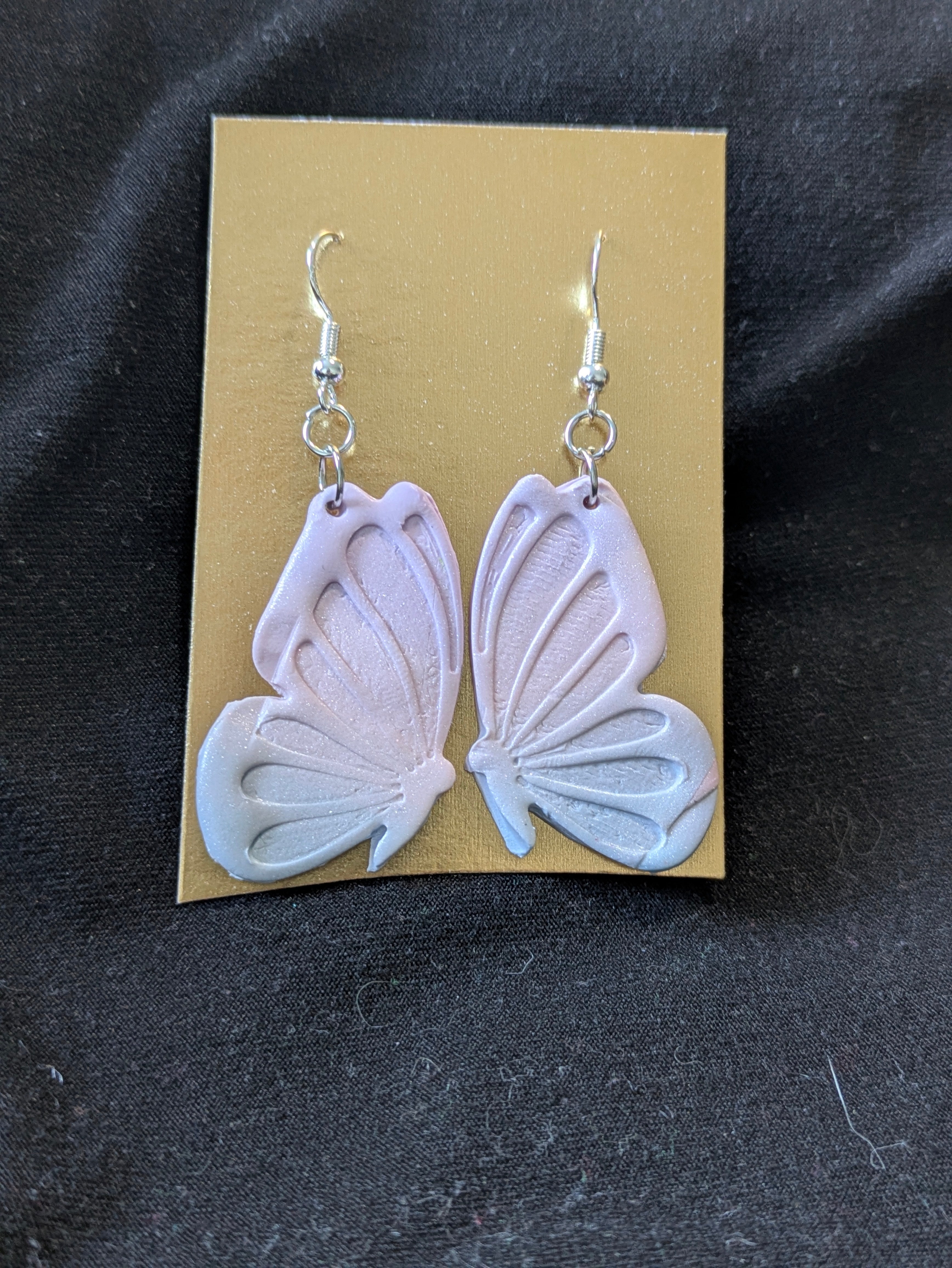 Purple pink and blue sparkly butterflies