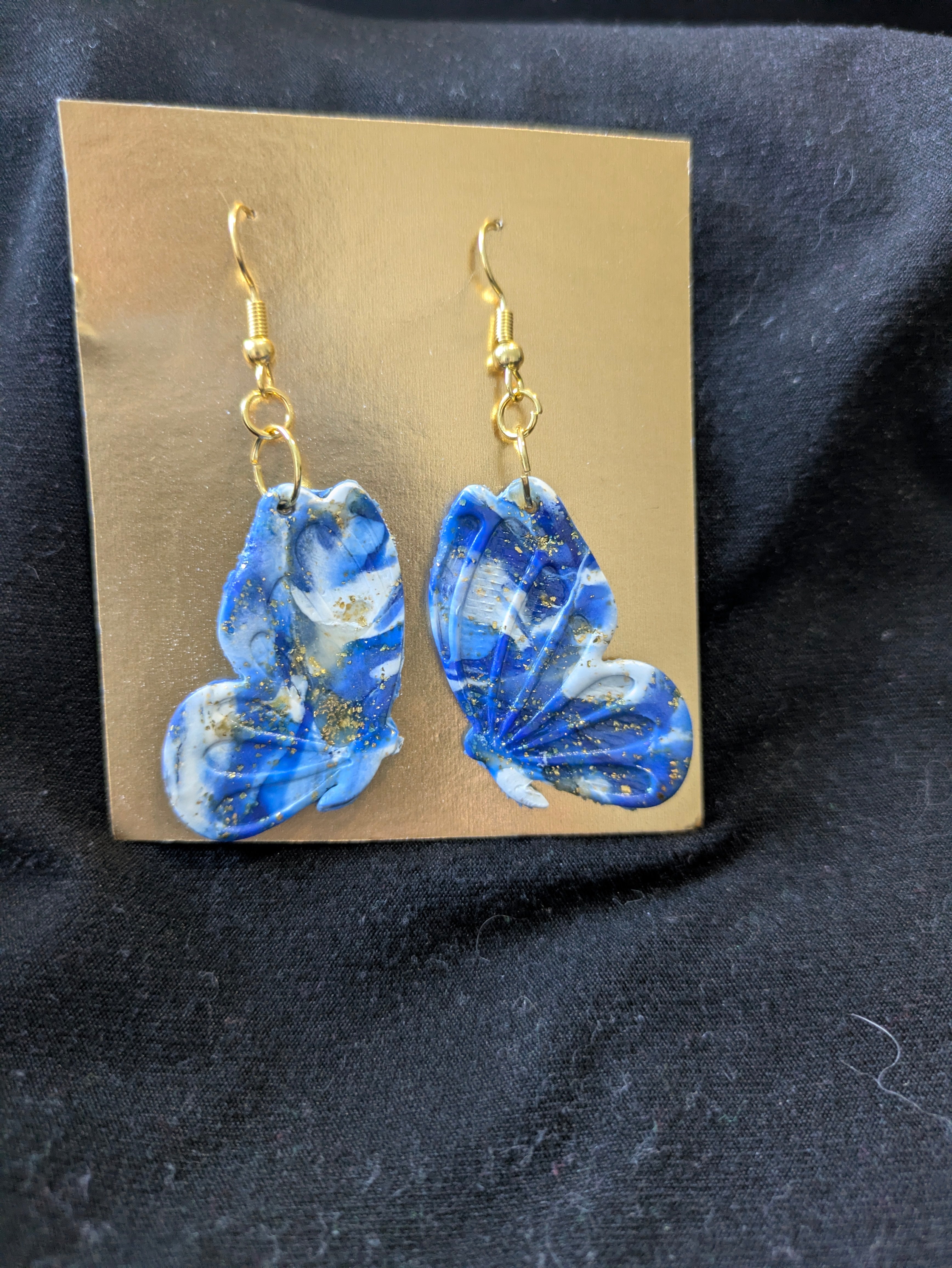 Blues and white with translucent and gold foil butterflies